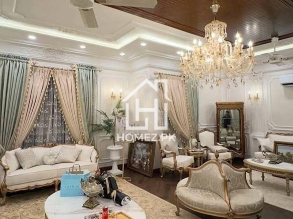 Luxurious 5 6 1 kanal residence in DHA Phase 6, Lahore featuring modern design, spacious rooms, prime location, secure gated community. Contact!!
