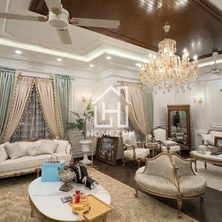 Luxurious 5 6 1 kanal residence in DHA Phase 6, Lahore featuring modern design, spacious rooms, prime location, secure gated community. Contact!!
