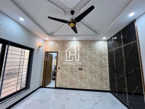 Premium 1 kanal house in DHA Phase 6 Lahore, PKR 13 Crore, modern design, spacious rooms, prime location, secure gated community, luxury living. elite!!