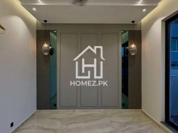 Experience luxury living in this beautifully designed 1 Kanal house located in the prestigious DHA Phase 6, Lahore.