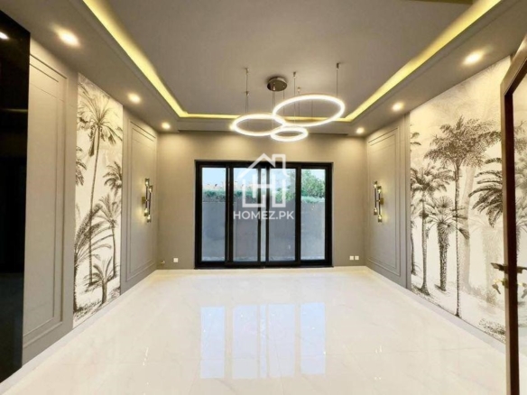 Spacious 1 Kanal house in DHA Phase 6 Lahore featuring beautiful interiors, wide lawn, modern kitchen, and excellent neighborhood access.