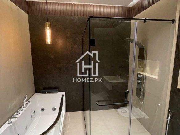 Luxury 1 Kanal house in DHA Phase 6 Lahore with modern design, spacious rooms, premium finishes, parking, and prime location access.