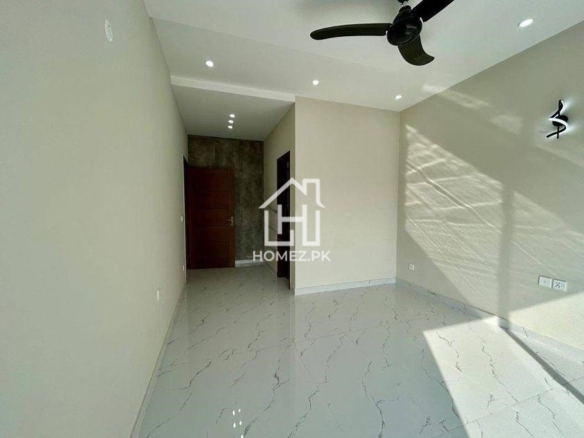 Spacious 5, 6 & 1 kanal house in DHA Phase 6, Lahore, featuring modern design, elegant interiors, prime location, and secure gated community.