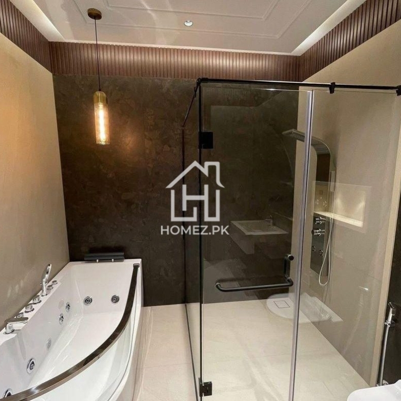 Luxury 1 Kanal house in DHA Phase 6 Lahore with modern design, spacious rooms, premium finishes, parking, and prime location access.