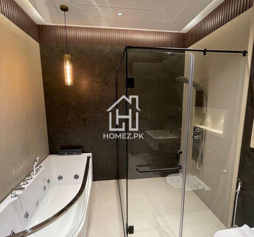 Luxury 1 Kanal house in DHA Phase 6 Lahore with modern design, spacious rooms, premium finishes, parking, and prime location access.