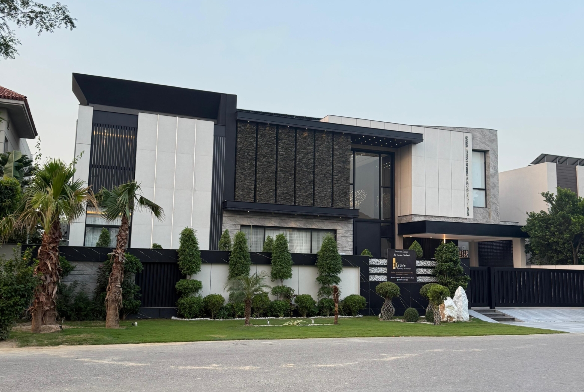 Luxury 1 Kanal house in DHA Phase 5 with modern design, spacious rooms, elegant interiors, and prime location near parks and markets.