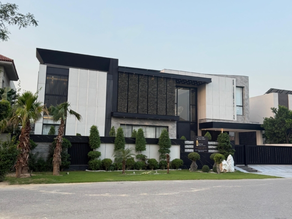 Luxury 1 Kanal house in DHA Phase 5 with modern design, spacious rooms, elegant interiors, and prime location near parks and markets.