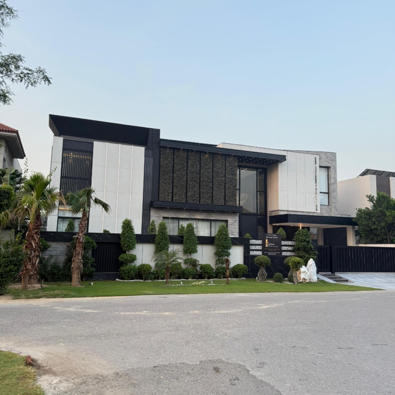 Luxury 1 Kanal house in DHA Phase 5 with modern design, spacious rooms, elegant interiors, and prime location near parks and markets.